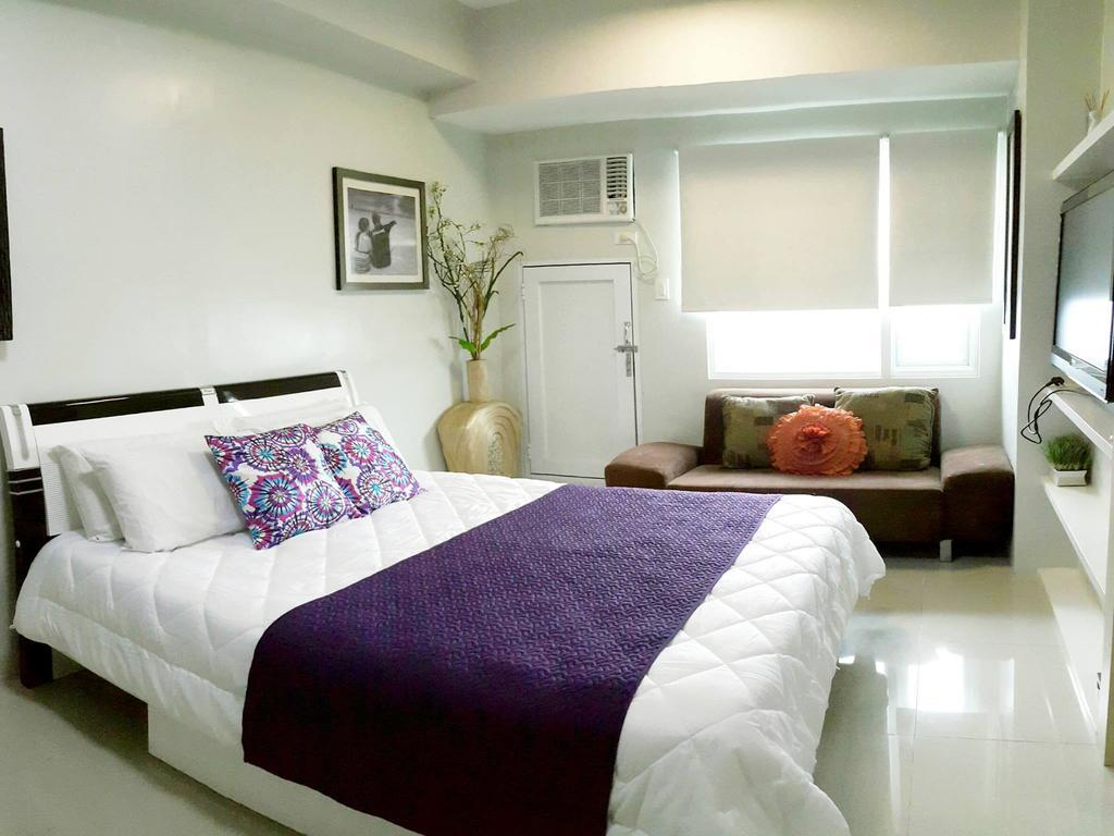 Grass Residences By Jg Vacation Rentals ケソンシティ 部屋 写真